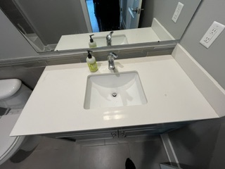 Clean bathroom vanity after move-out