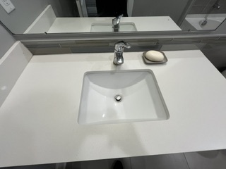 Clean bathroom sink after move-out service